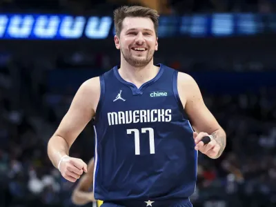 Jan 29, 2022; Dallas, Texas, USA; Dallas Mavericks guard Luka Doncic (77) laughs during the second half against the Indiana Pacers at American Airlines Center. Mandatory Credit: Kevin Jairaj-USA TODAY Sports