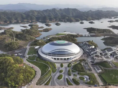 In this photo released by Xinhua News Agency, an aerial photo taken on March 28, 2022, shows a view of Chun'an Jieshou Sports Centre Velodrome, a venue of the 19th Asian Games Hangzhou 2022 in Hangzhou, eastern China's Zhejiang Province. Less than three months after Beijing hosted the Winter Olympics and Paralympics, the Olympic Council of Asia said Friday that this year's Asian Games in China are being postponed because of concerns about the spreading omicron variant of COVID-19 in the country.(Zhou Hengzhong/Xinhua via AP)