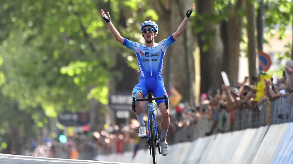 Cycling - Giro d'Italia - Stage 14 - Santena to Torino, Italy - May 21, 2022 Team BikeExchange - Jayco's Simon Yates celebrates winning stage 14 REUTERS/Jennifer Lorenzini
