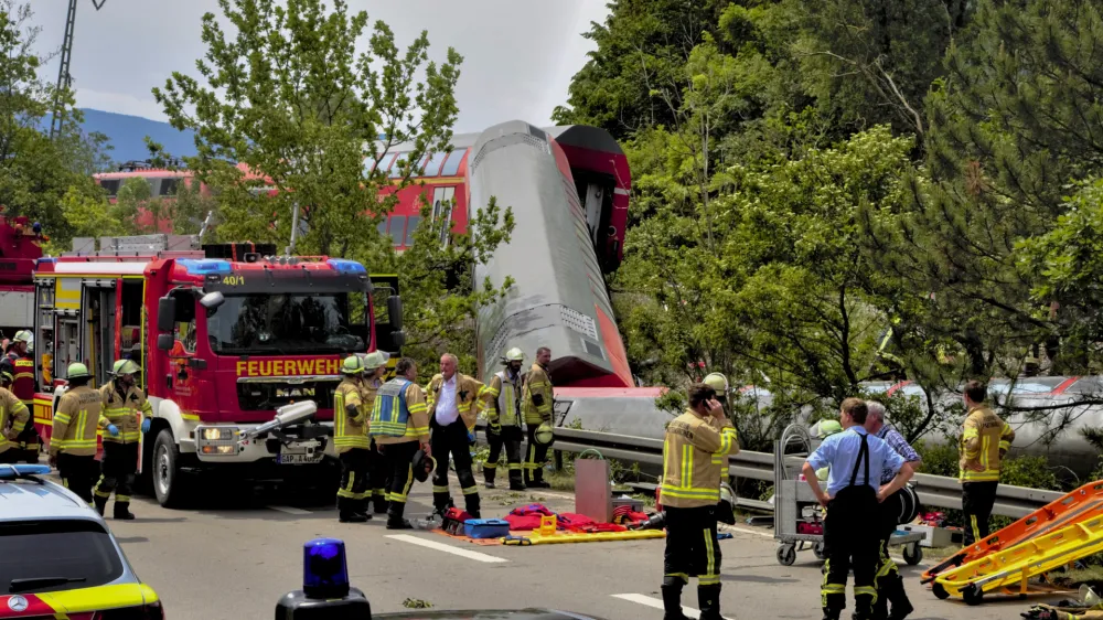 Numerous emergency and rescue forces are in action after a serious train accident in Garmisch-Partenkirchen, Germany, Friday, June 3, 2022. According to the authorities, at least three people have been killed and many injured. (Josef Hornsteiner/dpa via AP)