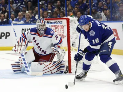 Jun 5, 2022; Tampa, Florida, USA; Tampa Bay Lightning left wing Ondrej Palat (18) skates with the puck as New York Rangers goaltender Igor Shesterkin (31) defends during the third period of the Eastern Conference Final of the 2022 Stanley Cup Playoffs at Amalie Arena. Mandatory Credit: Kim Klement-USA TODAY Sports