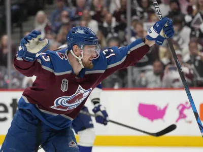 Colorado Avalanche right wing Valeri Nichushkin celebrates his goal against the Tampa Bay Lightning during the second period in Game 2 of the NHL hockey Stanley Cup Final, Saturday, June 18, 2022, in Denver. (AP Photo/John Locher)