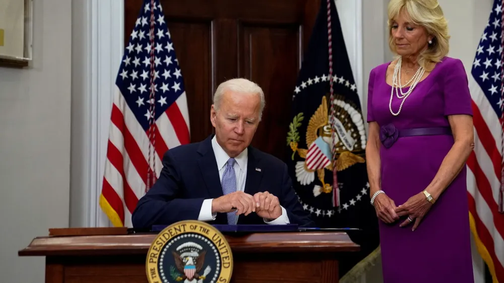U.S. President Joe Biden prepares to sign S. 2938: Bipartisan Safer Communities Act into law from the Roosevelt Room at the White House, in Washington, U.S., June 25, 2022. REUTERS/Elizabeth Frantz