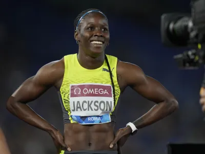 Shericka Jackson smiles after winning the women's 200-meter competitionat the Golden Gala Pietro Mennea IAAF Diamond League athletics meeting in Rome, Thursday, June 9, 2022. (AP Photo/Andrew Medichini)