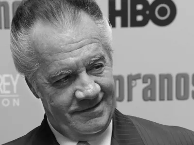 FILE - Tony Sirico, who plays the role of Paulie "Walnuts" Gualtieri in the hit HBO television series "The Sopranos", poses for photographers as he arrives to the world premiere of the sixth season in New York, Tuesday, March 7, 2006. Sirico, who played the impeccably groomed mobster Paulie Walnuts in "The Sopranos" and brought his tough-guy swagger to films including "Goodfellas," died Friday, July 8, 2022. He was 79. (AP Photo/Stuart Ramson, File)