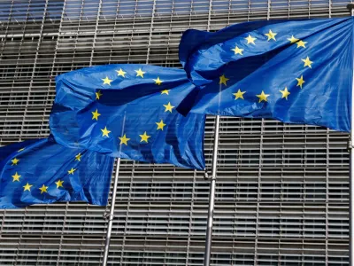 FILE PHOTO: European Union flags flutter outside the EU Commission headquarters in Brussels, Belgium June 17, 2022. REUTERS/Yves Herman/File Photo/File Photo