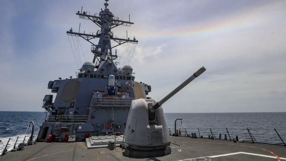 Arleigh Burke-class guided-missile destroyer USS Benfold (DDG 65), forward-deployed to the U.S. 7th Fleet area of operations, conducts underway operations in the South China Sea, July 19, 2022. U.S. Navy/Handout via REUTERS ATTENTION EDITORS - THIS IMAGE WAS PROVIDED BY A THIRD PARTY.