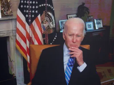 U.S. President Joe Biden, isolating following his COVID-19 diagnosis, appears virtually in a meeting with business and labor leaders about the Chips Act &mdash; relating to U.S. domestic chip and semiconductor manufacturing &mdash; in an auditorium on the White House campus in Washington, U.S., July 25, 2022. REUTERS/Jonathan Ernst