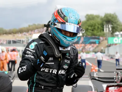 Formula One F1 - Hungarian Grand Prix - Hungaroring, Budapest, Hungary - July 30, 2022 Mercedes' George Russell celebrates after qualifying in pole position REUTERS/Bernadett Szabo