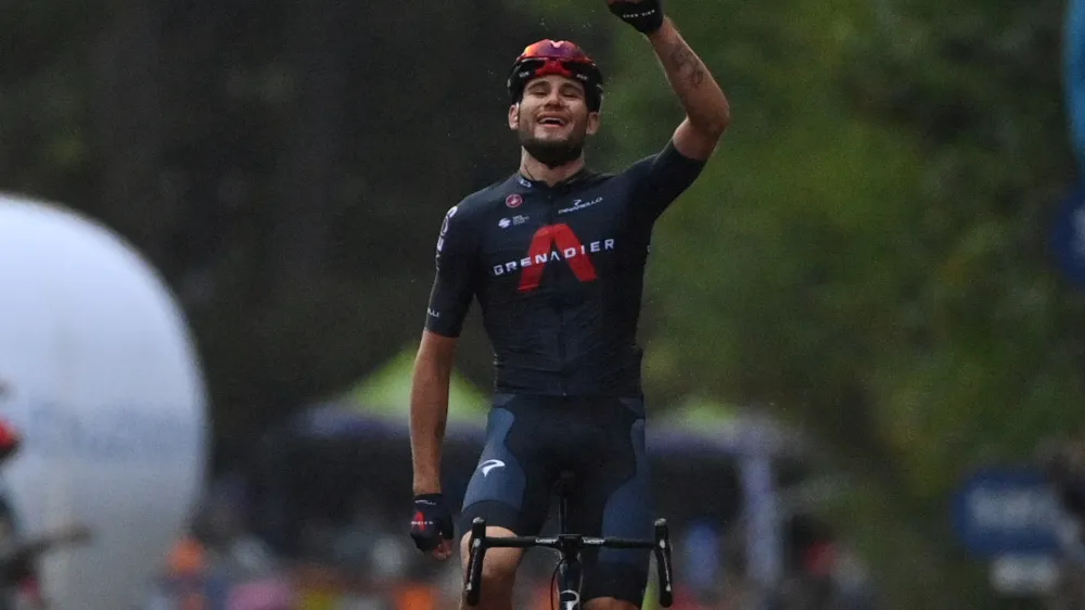 Filippo Ganna crosses the finish line to win the fifth stage of the Giro D'Italia, tour of Italy cycling race, from Mileto to Camigliatello Silano, Italy, Wednesday, Oct. 7, 2020. (Massimo Paolone/LaPresse via AP)