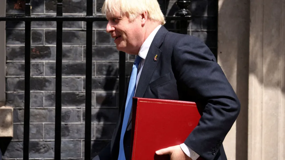 British Prime Minister Boris Johnson walks outside Downing Street in London, Britain, July 20, 2022. REUTERS/Henry Nicholls
