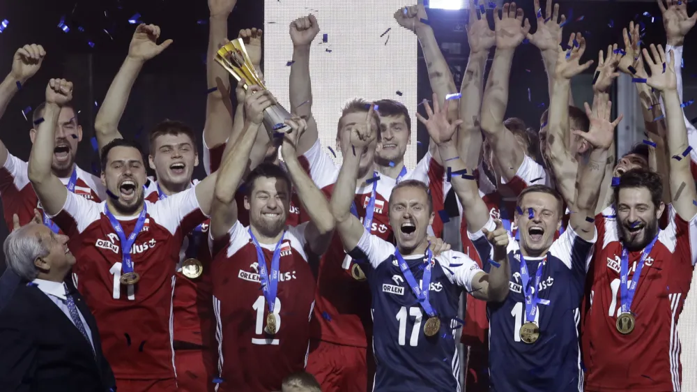 New world champions team Poland celebrates after winning the Men's World Championships volleyball final match between Brazil and Poland, in Turin, Italy, Sunday, Sept. 30, 2018. (AP Photo/Luca Bruno)