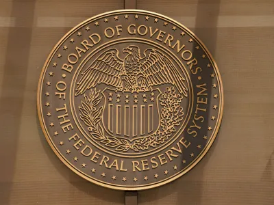 A sign for the Federal Reserve Board of Governors is seen at the entrance to the William McChesney Martin Jr. building ahead of a news conference by Federal Reserve Board Chairman Jerome Powell on interest rate policy, in Washington, U.S., September 21, 2022. REUTERS/Kevin Lamarque