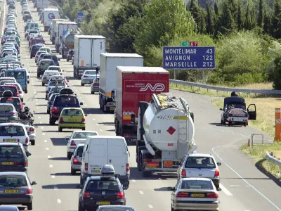 South-bound travelers jam the highway near Valence, central France, Friday, July 18, 2003. Traffic was expected to be very heavy throughout France over the week-end as more people head south for their summer vacations. (AP Photo/Patrick Gardin)