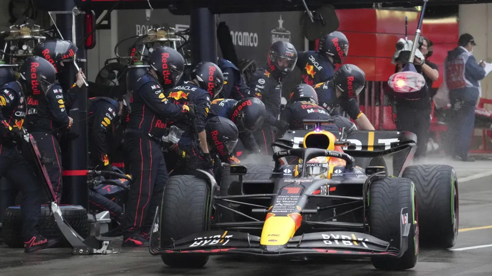 Red Bull driver Max Verstappen of the Netherlands powers his car out of the pits during the Japanese Formula One Grand Prix at the Suzuka Circuit in Suzuka, central Japan, Sunday, Oct. 9, 2022. (AP Photo/Toru Hanai, Pool)
