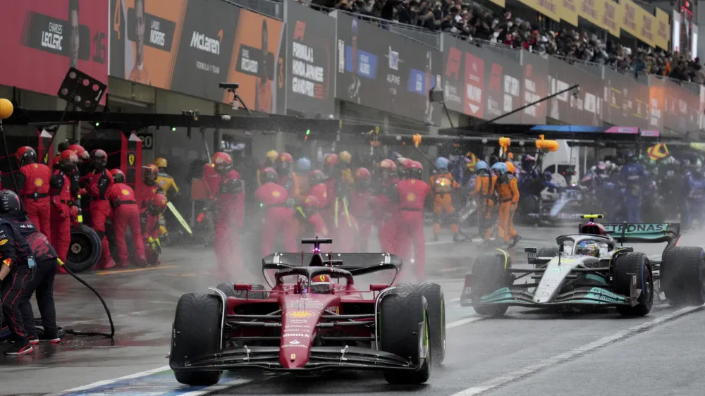Ferrari driver Charles Leclerc of Monaco powers his car out of the pits during the Japanese Formula One Grand Prix at the Suzuka Circuit in Suzuka, central Japan, Sunday, Oct. 9, 2022. (AP Photo/Toru Hanai, Pool)