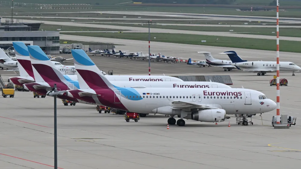 FILED - 06 October 2022, Stuttgart: Aircraft's of Eurowings airline are seen parked on the apron of the airport in Stuttgart. Photo: Bernd Wei&szlig;brod/dpa