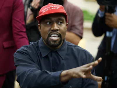 FILE - Rapper Kanye West speaks during a meeting in the Oval Office of the White House with President Donald Trump, Thursday, Oct. 11, 2018, in Washington. Kanye West was escorted out of the California headquarters of athletic shoemaker Skechers Wednesday, Oct. 26, 2022 after he showed up unannounced. Skechers says West, also known as Ye, also engaged in unauthorized filming at its corporate headquarters in Manhattan Beach and was escorted out by two executives. (AP Photo/Evan Vucci, File)