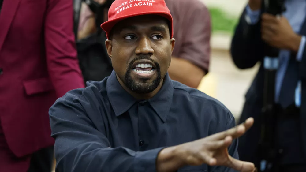 FILE - Rapper Kanye West speaks during a meeting in the Oval Office of the White House with President Donald Trump, Thursday, Oct. 11, 2018, in Washington. Kanye West was escorted out of the California headquarters of athletic shoemaker Skechers Wednesday, Oct. 26, 2022 after he showed up unannounced. Skechers says West, also known as Ye, also engaged in unauthorized filming at its corporate headquarters in Manhattan Beach and was escorted out by two executives. (AP Photo/Evan Vucci, File)