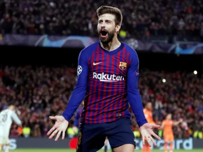 FILE PHOTO: Soccer Football - Champions League - Round of 16 Second Leg - FC Barcelona v Olympique Lyonnais - Camp Nou, Barcelona, Spain - March 13, 2019 Barcelona's Gerard Pique celebrates scoring their fourth goal        REUTERS/Juan Medina/File Photo
