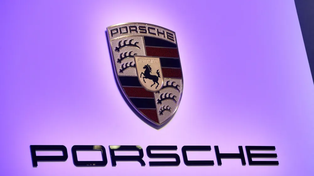 FILE PHOTO: The Porsche logo is seen duering the 2020 Porsche 911 Speedster reveal at the 2019 New York International Auto Show in New York City, New York, U.S, April 17, 2019. REUTERS/Brendan McDermid/File Photo