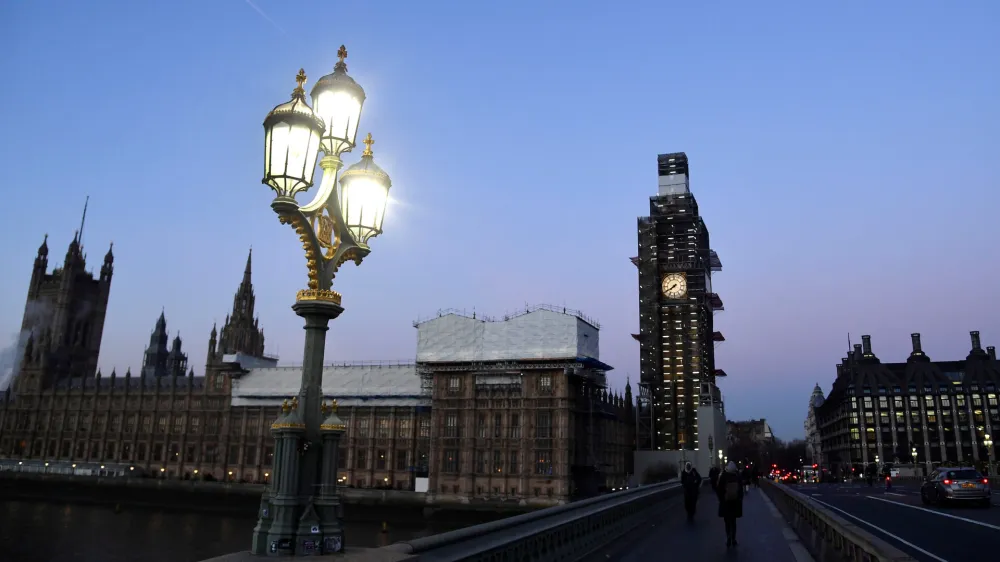 The sun comes up, silhouetting Big Ben and the Houses of Parliament, in Westminster London, Britain, December 11, 2018. REUTERS/Toby Melville