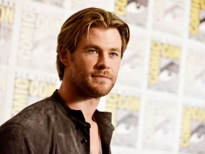 FILE - In this July 26, 2014 file photo, Chris Hemsworth attends the Marvel press line at Comic-Con International in San Diego. People magazine has named Chris Hemsworth the "Sexiest Man Alive" of 2014, cheering the Australian actor's rise as hammer-wielding, bone fide hunk in the "Thor" films. (Photo by Richard Shotwell/Invision/AP, File)