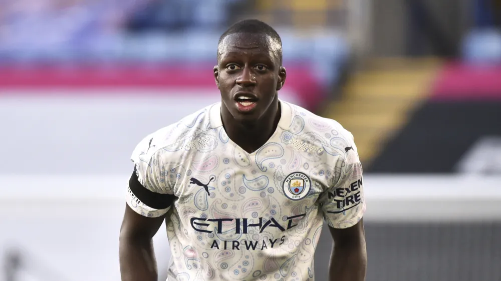 FILE - In this file photo dated Saturday, April 3, 2021, Manchester City's Benjamin Mendy during the English Premier League soccer match against Leicester City at the King Power Stadium in Leicester, England. Mendy will go on trial in January accused of raping two women and sexually assaulting a third alleged victim. He spoke only to confirm his name during a 45-minute hearing at a court in Chester in northwest England on Friday, Sept. 10. (AP Photo/Rui Vieira, FILE)