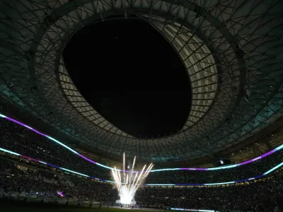 Artists perform ahead the World Cup group H soccer match between Portugal and Uruguay, at the Lusail Stadium in Lusail, Qatar, Monday, Nov. 28, 2022. (AP Photo/Themba Hadebe)