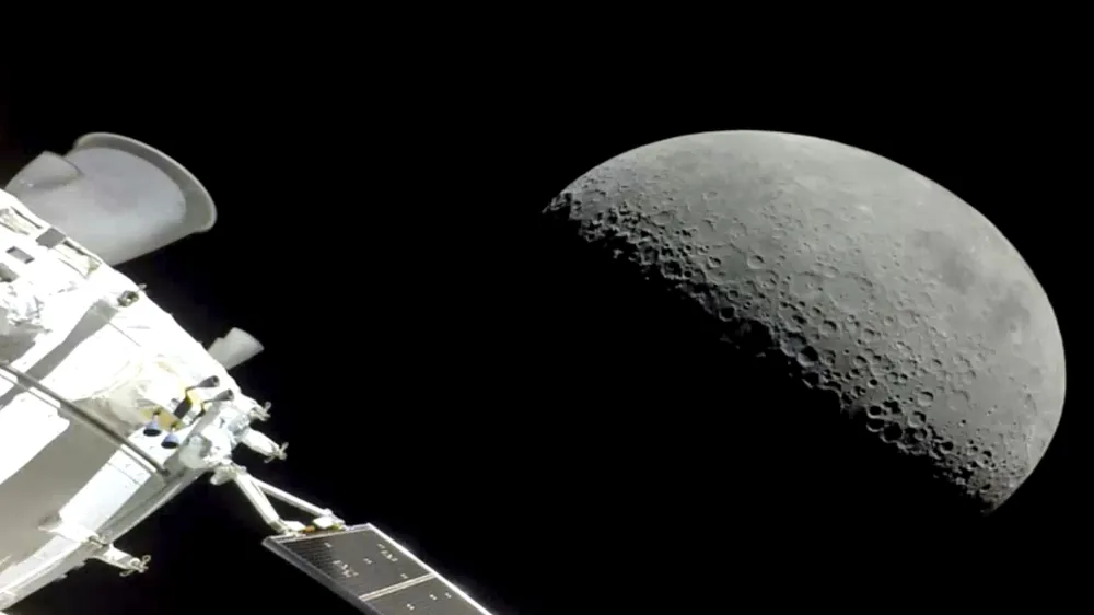 NASA's Orion spacecraft flew past the moon on Monday, December 5, 2022. The crew capsule and its test dummies will aim for a Pacific Ocean splashdown on Sunday, December 11, 2022, off the coast of San Diego after a three-week test flight, setting the stage for astronauts on the next flight in a couple years. (NASA via AP)