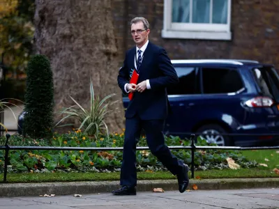 British Secretary of State for Wales David TC Davies walks outside Downing Street in London, Britain December 6, 2022. REUTERS/Peter Nicholls