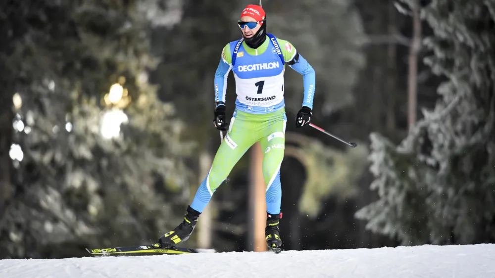 Slovenia's Jakov Fak competes during a men's 10km sprint race at the IBU World Cup biathlon season opening at Oestersund Ski Stadium in Oestersund, northern Sweden, Sunday, Nov. 28, 2021. (Anders Wiklund/TT via AP)
