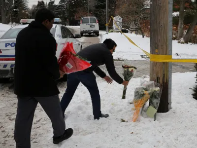 FILE PHOTO: Mourners place flowers outside the home of billionaire founder of Canadian pharmaceutical firm Apotex Inc., Barry Sherman and his wife Honey, who were found dead under circumstances that police described as "suspicious", in Toronto, Ontario, Canada, December 17, 2017. REUTERS/Chris Helgren/File Photo