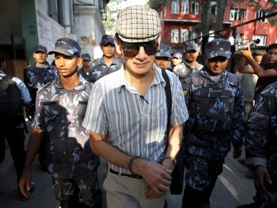 FILE PHOTO: French serial killer Charles Sobhraj leaves Kathmandu district court after his hearing in Kathmandu May 31, 2011. REUTERS/Navesh Chitrakar/File Photo