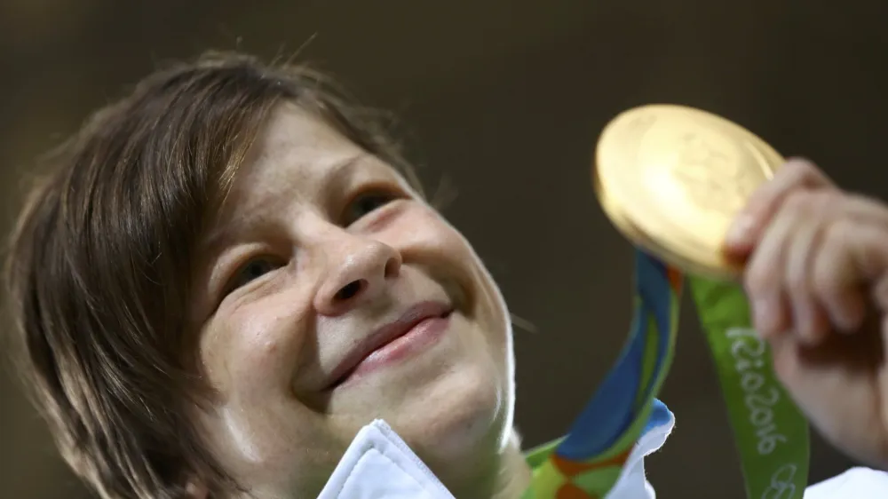 2016 Rio Olympics - Judo - Victory Ceremony - Women -63 kg Victory Ceremony - Carioca Arena 2 - Rio de Janeiro, Brazil - 09/08/2016. Tina Trstenjak (SLO) of Slovenia poses with her medal. REUTERS/Kai Pfaffenbach FOR EDITORIAL USE ONLY. NOT FOR SALE FOR MARKETING OR ADVERTISING CAMPAIGNS.
