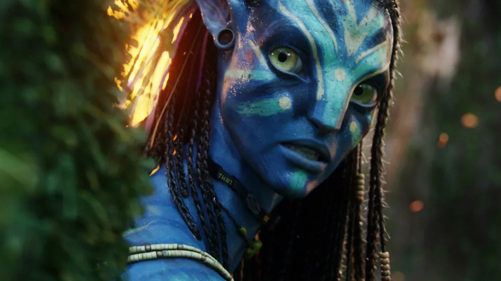 Filmmaker {James Cameron} is extending the world of {Avatar} by adding a fourth sequel to his franchise plans.<br>The director scored a box office hit in 2009 with the release of the original fantasy blockbuster, which starred Sam Worthington and Zoe Saldana. It currently holds the title as the highest-grossing movie in history.<br>He then announced there would be three follow-ups, with Avatar 2 scheduled to hit cinemas in late 2016, but last year (15), Cameron admitted the writing process was taking longer than expected, and the second instalment was postponed until Christmas, 2017.<br>Cameron made a surprise appearance at CinemaCon in Las Vegas on Thursday (14Apr16), and offered up both good and bad news to fans.<br>Addressing the crowds, he told devotees they would have to wait until the end of 2018 for Avatar 2, but then revealed he was adding an extra sequel to the timeline, taking the franchise tally to a total of five films.<br>"We're making four epic films that stand alone but together form a saga," he declared, according to Deadline.com. "These movies were designed to be seen in theatres first."<br>He went on to insist the films would be worth the wait, continuing, "I've been working with the top four screenwriters and designers in the world to design the world of Avatar going forward. The environments, new cultures... From what I'm seeing, the art on the wall... in pure imagination is just beyond the first film. I'm speechless."<br>Avatar 3 is pegged for release in 2020, with the fourth and fifth instalments following in 2022 and 2023. <br><br>Avatar (2009)<br>directed by James Cameron<br>shown: Zoe Saldana<br><br>When: 15 Apr 2016<br>Credit: WENN.com<br><br>**WENN does not claim any ownership including but not limited to Copyright, License in attached material. Fees charged by WENN are for WENN's services only, do not, nor are they intended to, convey to the user any ownership of Copyright, License in material. By publishing this material you expressly agree to indemnify, to hold WENN, its directors, s