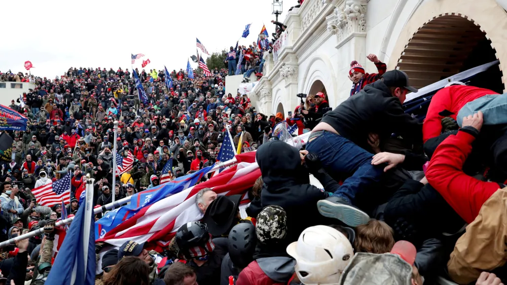 FILE PHOTO: FILE PHOTO: FILE PHOTO: Pro-Trump protesters storm into the U.S. Capitol during clashes with police, during a rally to contest the certification of the 2020 U.S. presidential election results by the U.S. Congress, in Washington, U.S, January 6, 2021. REUTERS/Shannon Stapleton/File Photo/File Photo/File Photo