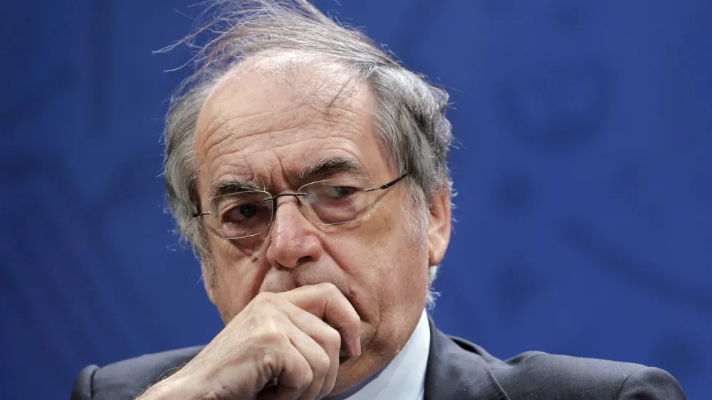 FILE - Head of French Football Federation (FFF) Noel Le Graet attends a press conference in Paris, Wednesday, March 2, 2016. The president of France's soccer federation apologized Monday Jan.9, 2023 after Kylian Mbapp&eacute;, the French sports minister and Real Madrid all took him to task for brusque comments that he "couldn't care less" about Zin&eacute;dine Zidane's future as a coach. (AP Photo/Christophe Ena, File)