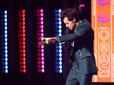 Harry Styles speaks after receiving the award for Song of the Year at the Brit Awards at the O2 Arena in London, Britain, February 11, 2023. REUTERS/Henry Nicholls