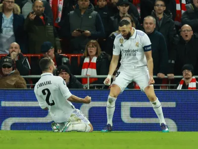 Karim Benzema (desno) je postal prvi nogometa&scaron; v zgodovini lige prvakov, ki je gole v tem tekmovanju dosegel v 19 zaporednih koledarskih letih. Foto: Reuters