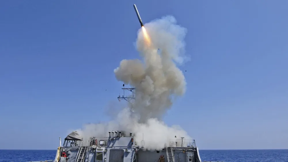 The guided-missile destroyer USS Barry launches a Tomahawk cruise missile from the ship's bow in the Mediterranean Sea in this U.S. Navy handout photo taken March 29, 2011. Barry is one of four U.S. destroyers currently deployed in the Mediterranean Sea equipped with long-range Tomahawk missles that could potentially be used to strike Syria, according to officials.  REUTERS/Jonathan Sunderman/U.S. Navy/Handout/Files  (ITALY - Tags: MILITARY POLITICS CIVIL UNREST) FOR EDITORIAL USE ONLY. NOT FOR SALE FOR MARKETING OR ADVERTISING CAMPAIGNS