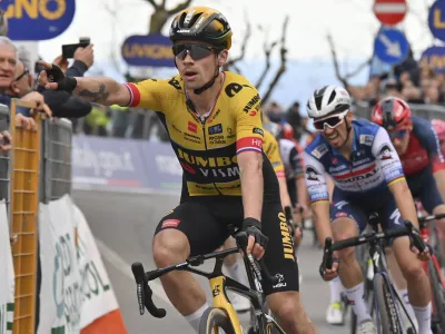 Slovenia's Primoz Roglic celebrates winning the fourth stage of the Tirreno Adriatico cycling race from Greccio to Tortoreto, Italy, Thursday, March 9, 2023. ((Gian Mattia D'Alberto/LaPresse via AP)