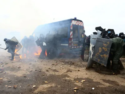 Protesters clash with the gendarmerie during a demonstration called by the collective "Bassines Non Merci" against the "basins" on the construction site of new water storage infrastructure for agricultural irrigation in western France, in Sainte-Soline, France March 25, 2023. REUTERS/Yves Herman