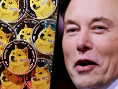 A photo of Elon Musk is displayed on a smartphone placed on representations of cryptocurrency Dogecoin in this illustration taken June 16, 2022. REUTERS/Dado Ruvic/Illustration