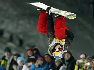 Slovenia's Tim-Kevin Ravnjak competes to place third at the snowboard half pipe final event at the Freestyle Ski and Snowboard World Championships in Kreischberg, Austria, Saturday, Jan. 17, 2015. (AP Photo/Darko Bandic)