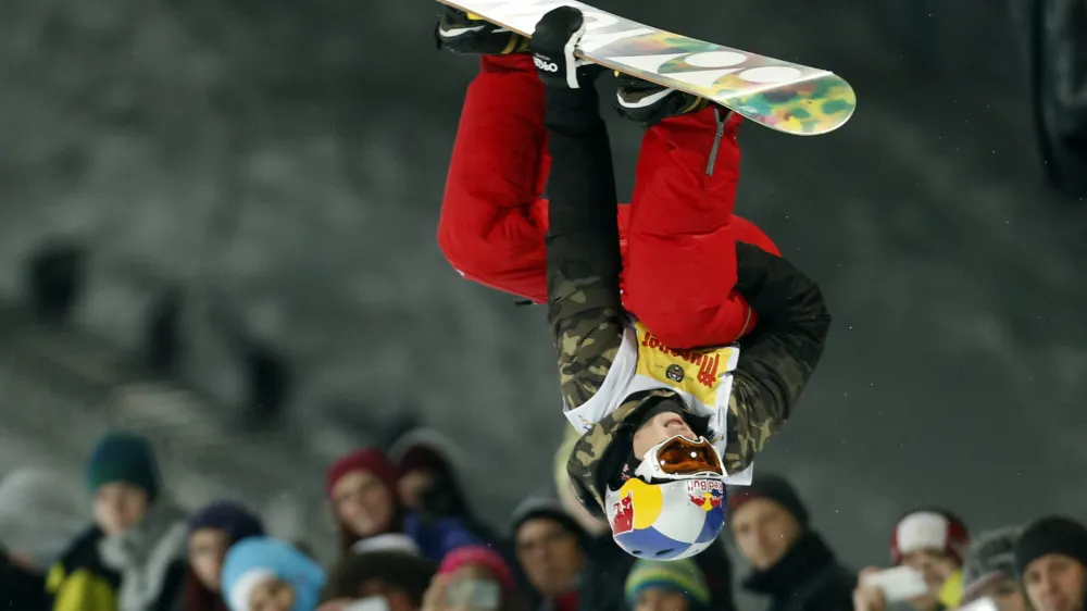 Slovenia's Tim-Kevin Ravnjak competes to place third at the snowboard half pipe final event at the Freestyle Ski and Snowboard World Championships in Kreischberg, Austria, Saturday, Jan. 17, 2015. (AP Photo/Darko Bandic)