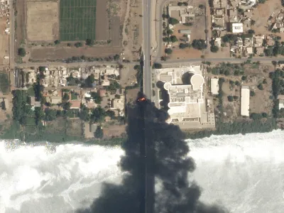 This satellite photo by Planet Labs PBC shows fires burning near a hospital in Khartoum, Sudan, Sunday April 16, 2023. The Sudanese military and a powerful paramilitary group are battling for control of the chaos-stricken nation for a second day. (Planet Labs PBC via AP)