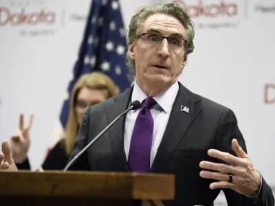 FILE - North Dakota Gov. Doug Burgum speaks at the state Capitol on April 10, 2020, in Bismarck, N.D. Burgum signed an abortion ban at six weeks of pregnancy &mdash; even in cases of rape or incest &mdash; into law on Monday, April 24, 2023. (Mike McCleary/The Bismarck Tribune via AP, File)