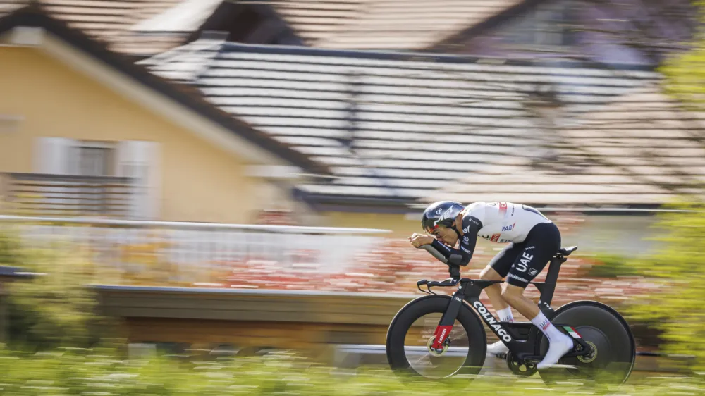 Juan Ayuso from Spain in action during the prologue, a 6,82 km race against the clock, at the 76th Tour de Romandie UCI World Tour Cycling race, in Le Bouveret, Switzerland, Tuesday, April 25, 2023. (Valentin Flauraud/Keystone via AP)