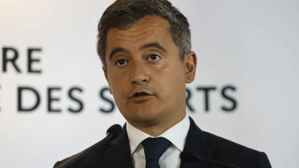 rench Interior Minister Gerald Darmanin speaks during a press conference Monday, May 30, 2022 in Paris. The British government says it's deeply concerned over the treatment of Liverpool supporters by French authorities, who blamed fans for unrest at the Champions League final amid overcrowding outside the Stade de France. (AP Photo/Jean-Francois Badias)